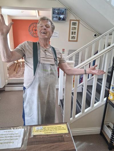A friendly member of our shop team